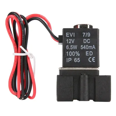 A close-up studio shot of a black solenoid valve with red and black wires.