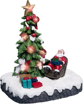 Image de Village de Noël, scène avec Saint-Nicolas près de l'arbre