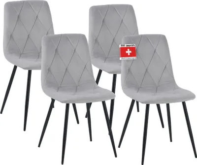 Four gray dining chairs with diamond-stitched upholstery and black metal legs are arranged together on a white background.