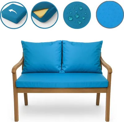 A blue cushion set on a wooden bench.