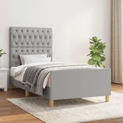 Immagine prodotto di Giroletto con testiera in tessuto grigio chiaro 90x190 cm