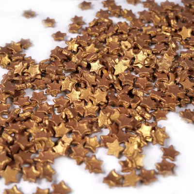 Produktbild von Streuselheld Schokosterne Gold 40g Streusel zum Dekorieren und Verzieren von Gebäck aller Art wie Torten Kuchen Keksen Zuckerstreusel