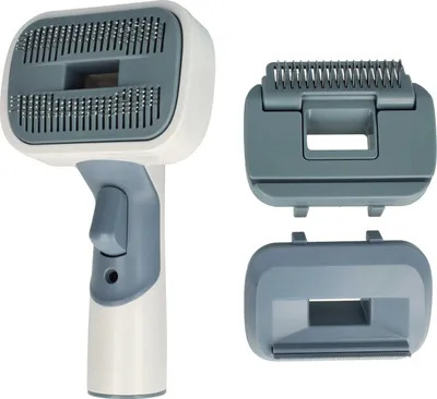 A grooming tool and its attachments against a white background.