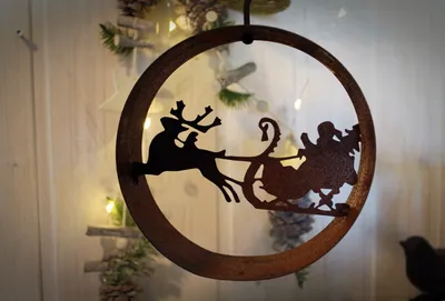 Immagine prodotto di Babbo Natale con slitta arrugginita