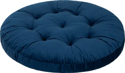 A round, tufted, navy blue cushion.