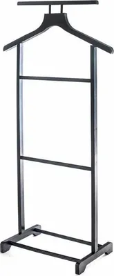 A dark wooden valet stand against a white background.