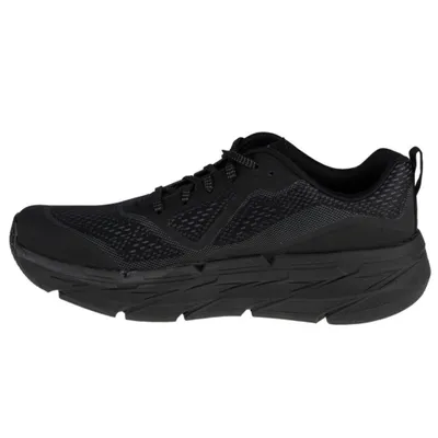 A side view of a black sneaker on a white background.