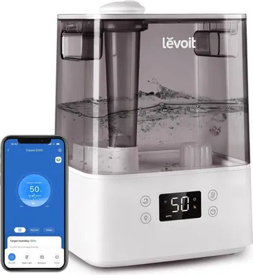 A Levoit humidifier and a smartphone displaying its app are shown.