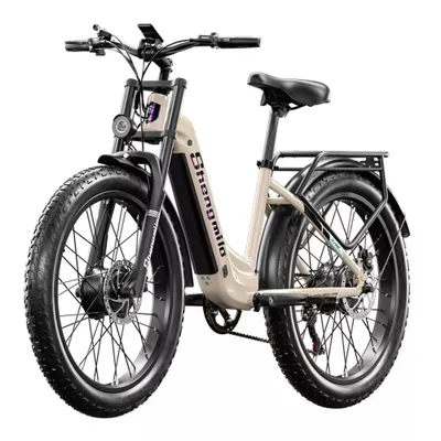 A studio shot of a beige electric mountain bike against a white background.