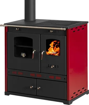 A red and black wood-burning stove with a visible fire in one of its glass doors.
