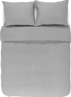 A top-down view of a grey duvet cover and two pillowcases laid out on a white surface.