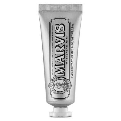 A silver tube of Marvis Whitening Mint toothpaste is shown against a white background.