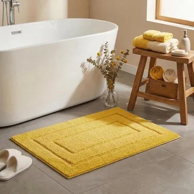 Image de Tapis de bain Unyqoos® jaune, 50x80 cm – tapis doux et absorbant, avec un dessous en TPR antidérapant, lavable en machine