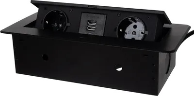 A black, pop-up desk outlet with two European-style sockets and two USB ports, shown from a slightly elevated front-side angle.