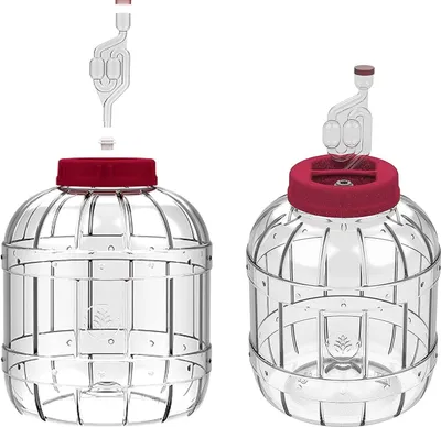 Two clear plastic fermentation vessels with red lids and airlocks, shown separately.