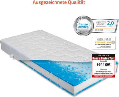 A mattress with a cutaway view showing its layers, surrounded by marketing badges and certifications.