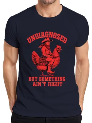 Immagine prodotto di T-shirt da uomo "Cowboy Huhn Western", colore blu navy, taglia L, con scritta "Undiagnosed But Something Ain't Right" (traduzione approssimativa: "Non diagnosticato, ma qualcosa non va")