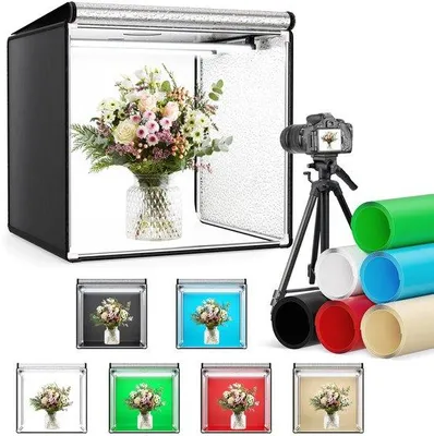 Produktbild von Unyqoos® Tragbare Fotostudio-Lichtbox für Produktfotografie – 360° drehbare LED, stufenlos dimmbar 0–100%, 3000–5600K, faltbar, 6 Hintergründe, inkl. Ständer & Tasche