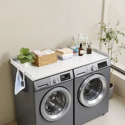 Productafbeelding van VEVOR werkblad voor wasmachine en droger (137 x 69,9 cm) met verhoogde rand en haken, voor organisatie en opslag in de wasruimte, provisiekelder of keuken. Draagvermogen: 113 kg, wit