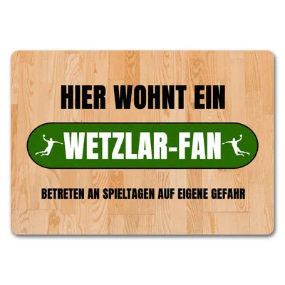 Produktbild von Hier wohnt ein Wetzlar-Fan Fußmatte in 35x50 cm ohne Rand mit Turnhallenboden