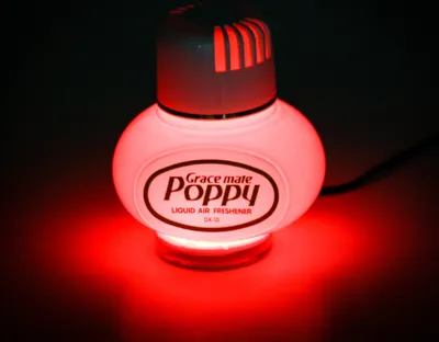 Produktbild von Original Poppy Lufterfrischer mit roter LED Beleuchtung 24 Volt, Duft Inhalt 150 ml, Duft Jasmin