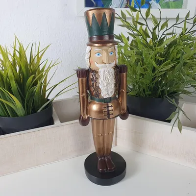 Produktbild von Nussknacker Figur mit Zylinderhut und Vollbart bronze-grün 24 cm Kunstharz – Weihnachtsdeko
