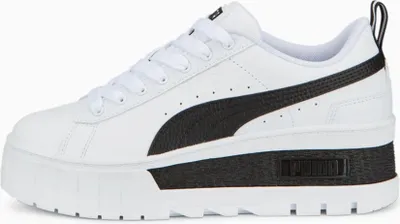 A side view of a white Puma Mayze Wedge sneaker with black accents.
