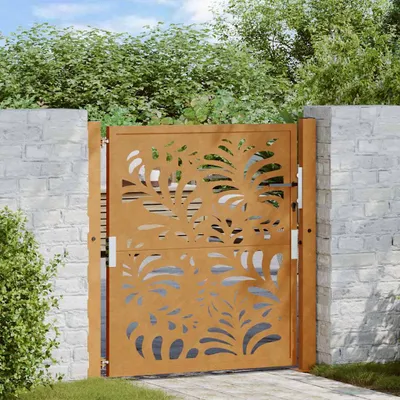 A decorative garden gate with a leaf pattern, set between two brick walls with greenery and sky in the background.