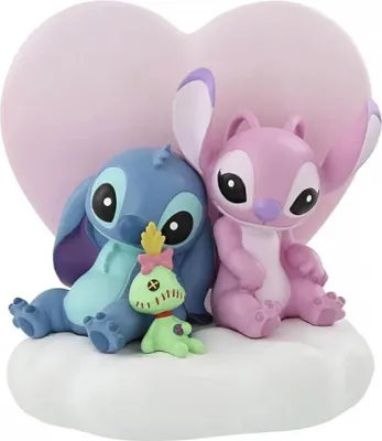 A figurine set of Stitch and Angel from Disney's Lilo & Stitch, sitting on a cloud with a pink heart behind them.