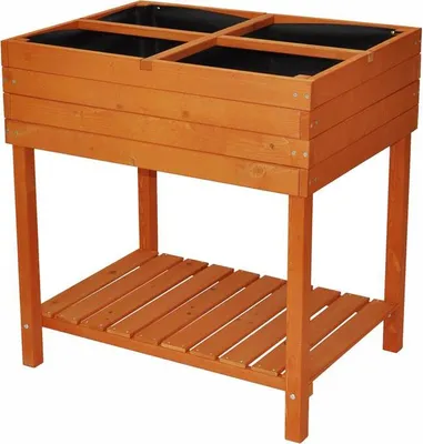 A wooden raised garden bed with four compartments, shown on a white background.