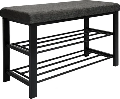 A shoe bench with a padded seat and two shelves for storage.