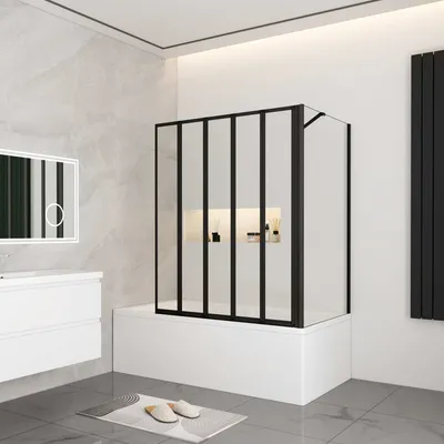 A modern bathroom with a bathtub, shower enclosure, vanity, and mirror.
