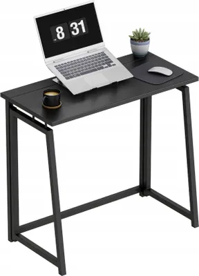 A black folding desk with a laptop, a mug, a plant, and a mouse on it.