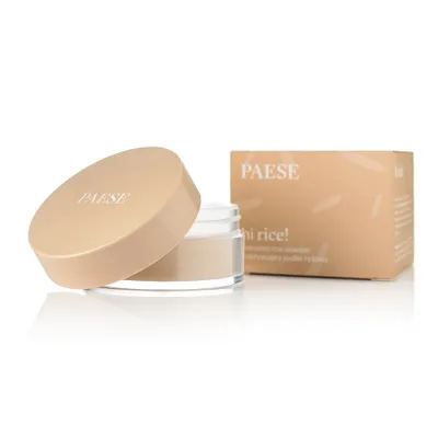 A makeup product, a loose powder in a jar with its lid off, next to its packaging box.