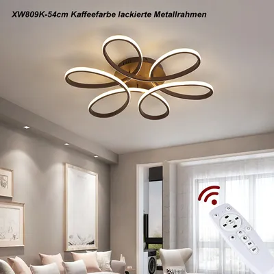 A modern living room with a ceiling light and a remote control.