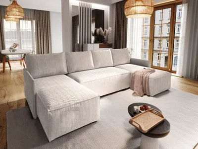 A modern living room with a large sectional sofa, coffee table, and dining area visible in the background.