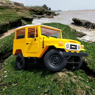 Immagine prodotto di C-34 1:16 Radio telecomando arrampicata Offroad veicolo giocattolo per bambini (giallo)