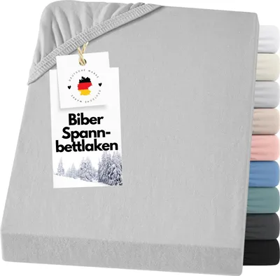 A folded fitted sheet with a tag attached.