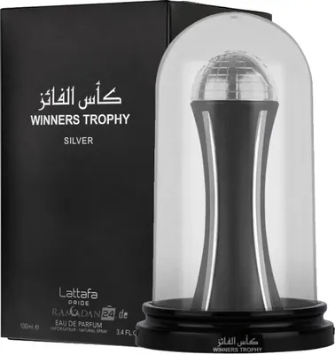 A perfume bottle shaped like a trophy, presented in its packaging.