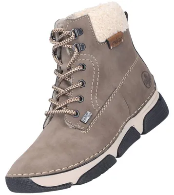 Auf dem Bild ist ein brauner Stiefel zu sehen der von der Seite gezeigt wird Die Seite ist die Außenseite des Stiefels die eine Schnürung und eine Reißverschlussöffnung aufweist