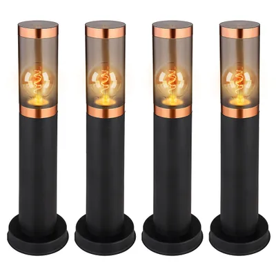 Four identical black and copper bollard lights with glass shades and exposed filament bulbs are arranged in a row against a white background.