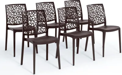 A set of six identical chairs arranged in a studio setting.