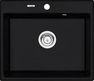 A black kitchen sink with a silver drain.