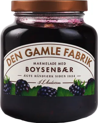 A jar of boysenberry jam with a label showing the brand, product name, and illustrations of boysenberries.