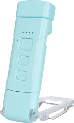 A teal-colored LED book light with a clip stand.