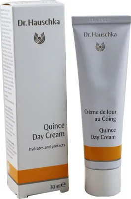A box and a tube of Dr. Hauschka Quince Day Cream are shown side-by-side against a white background.