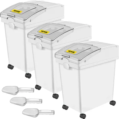 Three white food storage containers of varying sizes are arranged diagonally, with three clear scoops in the foreground.