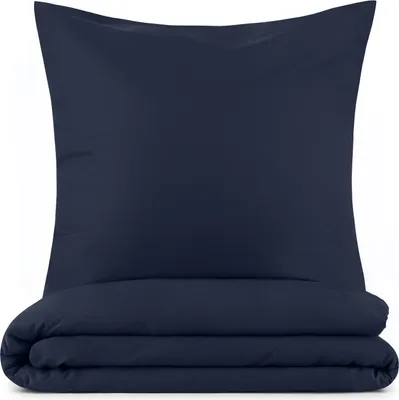 A folded dark blue duvet and a dark blue pillowcase are presented on a white background.