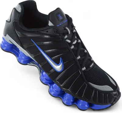 A studio shot of a Nike Shox TL sneaker against a white background.