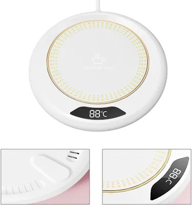 A white circular cup warmer with a digital display showing the temperature.